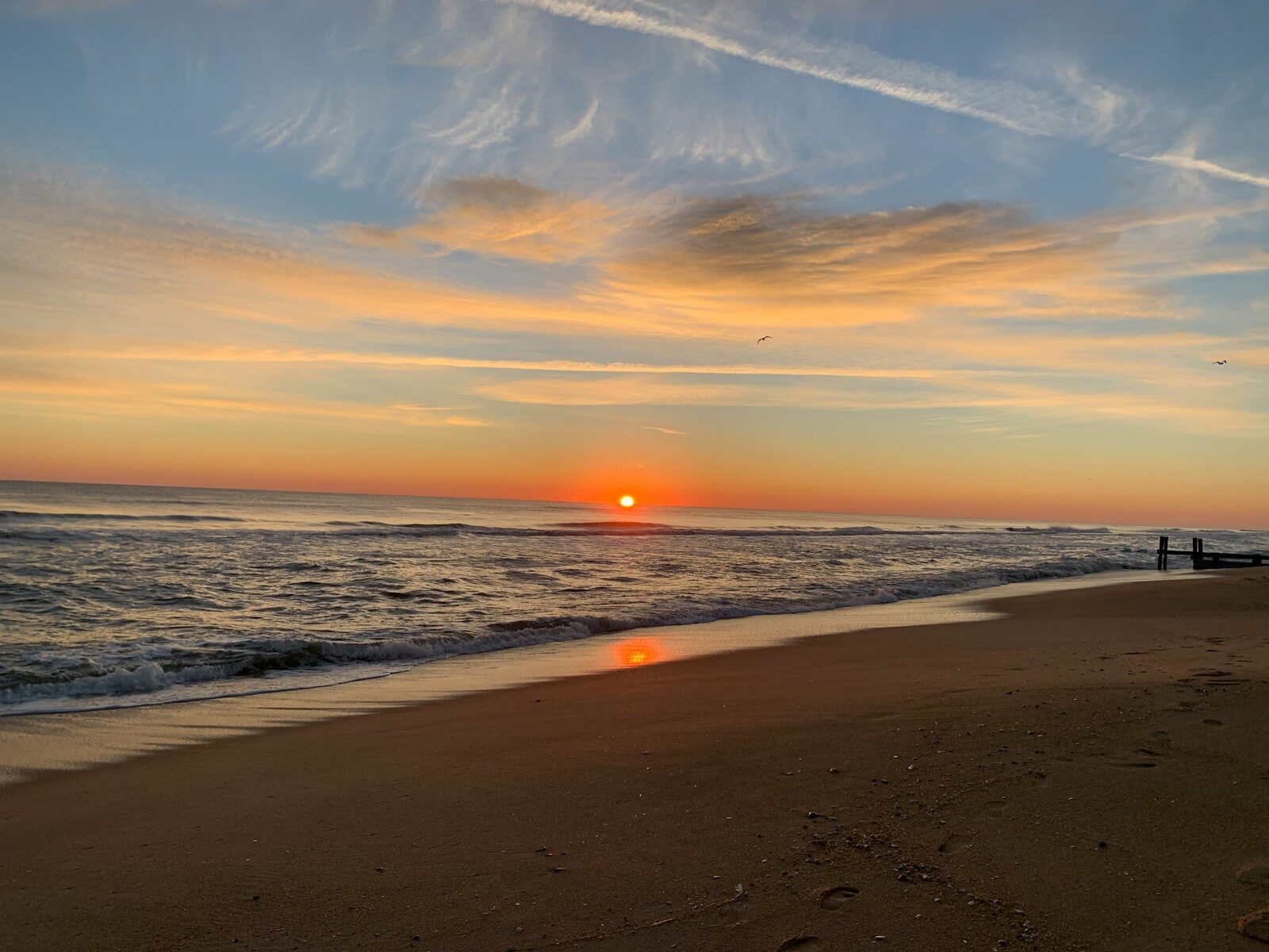 Sunset over the Atlantic Ocean on an Outer Banks beach in North Carolina